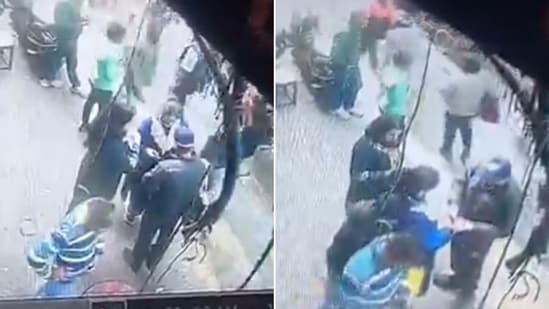 The image shows a man stealing an iPhone from a woman in Varanasi. (X/@shehjarr_)