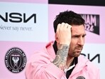 Lionel Messi reacts after taking a question about his team's previous match in Hong Kong. Lionel Messi reacts after taking a question about his team's previous match in Hong Kong.