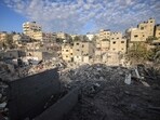 The rubble of destroyed buildings in a residential area targeted by Israeli missiles in the center of Khan Younis, southern Gaza,(Bloomberg)