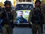 A portrait of Abu Baqir al-Saadi, a prominent leader in the Phalange, who was killed in a strike carried out a day earlier by an American drone that targeted his car in a vital neighbourhood in Baghdad, is plastered on a car during his funeral in Baghdad on February 8, 2024 A portrait of Abu Baqir al-Saadi, a prominent leader in the Phalange, who was killed in a strike carried out a day earlier by an American drone that targeted his car in a vital neighbourhood in Baghdad, is plastered on a car during his funeral in Baghdad on February 8, 2024