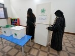Members of the polling staff set up a polling station for the Feb. 8 parliamentary elections, in Karachi, Pakistan. (AP) Members of the polling staff set up a polling station for the Feb. 8 parliamentary elections, in Karachi, Pakistan. (AP)