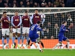 Chelsea's Enzo Fernandez scores their third goal from a free kick.
