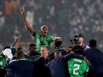 Nigeria's Victor Osimhen celebrates with teammates after reaching the Africa Cup of Nations final.