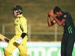 Australia's Raf MacMillan (L) celebrates after scoring the winning runs in U19 World Cup semi-final against Pakistan Australia's Raf MacMillan (L) celebrates after scoring the winning runs in U19 World Cup semi-final against Pakistan