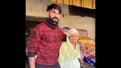 A file photo of victim Amritpal Singh with his mother, Rajwinder Kaur. (HT Photo)