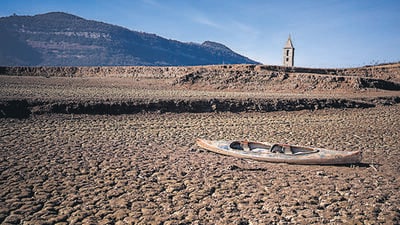 An abandoned canoe lies on the cracked ground at the Sau reservoir, which is only at 5 percent of its capacity, in Vilanova de Sau, about 100 km north of Barcelona, Spain, Monday, Jan. 22, 2024. (AP) An abandoned canoe lies on the cracked ground at the Sau reservoir, which is only at 5 percent of its capacity, in Vilanova de Sau, about 100 km north of Barcelona, Spain, Monday, Jan. 22, 2024. (AP)