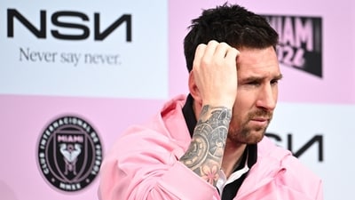 Lionel Messi reacts after taking a question about his team's previous match in Hong Kong. (AFP) Lionel Messi reacts after taking a question about his team's previous match in Hong Kong. (AFP)