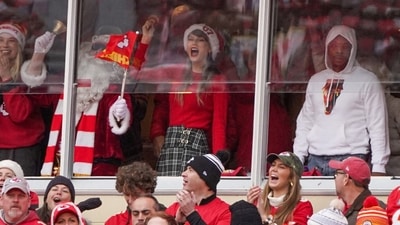 FILE PHOTO: Dec 25, 2023; Kansas City, Missouri, USA; Entertainer Taylor Swift cheers during the first half of the game between the Kansas City Chiefs and Las Vegas Raiders at GEHA Field at Arrowhead Stadium. Mandatory Credit: Denny Medley-USA TODAY Sports/File Photo (USA TODAY Sports via Reuters Con)
