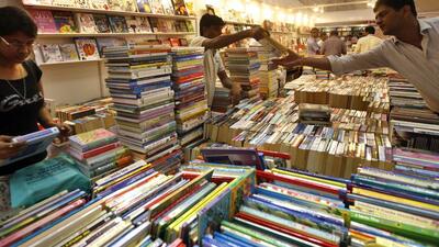 New Delhi, India - Aug. 28, 2015: People visit the Delhi Book Fair 2015 at Pragati Maidan on Saturday 29, 2015 in New Delhi, India. Book Fair also gives teachers, librarians and children an opportunity for interaction with authors, publishers and book-sellers, (Photo by Arun Sharma/ Hindustan Times) New Delhi, India - Aug. 28, 2015: People visit the Delhi Book Fair 2015 at Pragati Maidan on Saturday 29, 2015 in New Delhi, India. Book Fair also gives teachers, librarians and children an opportunity for interaction with authors, publishers and book-sellers, (Photo by Arun Sharma/ Hindustan Times)