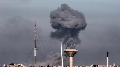 This picture taken from Rafah, in the southern Gaza Strip, shows smoke rising over buildings in Khan Yunis during Israeli bombardment on February 8, 2024, (AFP) This picture taken from Rafah, in the southern Gaza Strip, shows smoke rising over buildings in Khan Yunis during Israeli bombardment on February 8, 2024, (AFP)