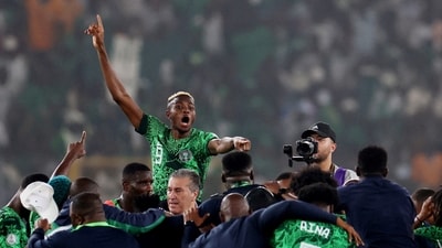Nigeria's Victor Osimhen celebrates with teammates after reaching the Africa Cup of Nations final. (REUTERS)