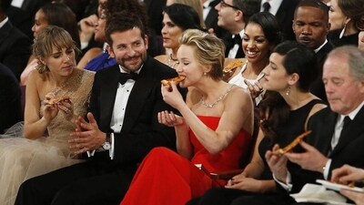 Actor Jennifer Lawrence ate a slice of pizza during the 2014 Oscar Awards