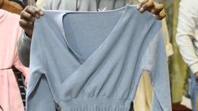 Sweater dress for a chic and cosy date night. Price: <span class='webrupee'>₹</span>25 at Shop 197, Sarojini Nagar. (Photo: Manoj Verma/HT) Sweater dress for a chic and cosy date night. Price: <span class='webrupee'>₹</span>25 at Shop 197, Sarojini Nagar. (Photo: Manoj Verma/HT)