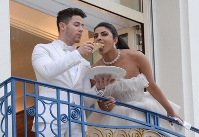 Nick Jonas feeds wife Priyanka Chopra Jonas a slice of pizza on the balcony before they hit the red carpet in Cannes (Instagram)