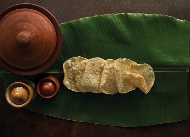 Poppadom isn’t the same as papad. We don’t eat our papad readymade, we cook it. (Adobe Stock) Poppadom isn’t the same as papad. We don’t eat our papad readymade, we cook it. (Adobe Stock)
