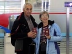 Tourists show their passports as a group of Russian tourists, likely the first foreign travelers from any country to enter North Korea since the pandemic arrive at the Pyongyang International Airport in Pyongyang. Tourists show their passports as a group of Russian tourists, likely the first foreign travelers from any country to enter North Korea since the pandemic arrive at the Pyongyang International Airport in Pyongyang.