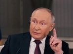 Russian President Vladimir Putin speaks during an interview with U.S. television host Tucker Carlson in Moscow, Russia, February 6, 2024, in this still image taken from video released February 8, 2024.