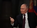 In this pool photograph distributed by Russian state agency Sputnik, Russia's President Vladimir Putin gives an interview to US talk show host Tucker Carlson at the Kremlin in Moscow on February 6, 2024. (Photo by Gavriil GRIGOROV / POOL / AFP)