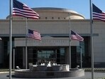 Flags fly at half-mast in front of the George H.W. Bush Presidential Library Center on the campus of Texas A&M University on December 2, 2018 in College Station, Texas. Flags fly at half-mast in front of the George H.W. Bush Presidential Library Center on the campus of Texas A&M University on December 2, 2018 in College Station, Texas.
