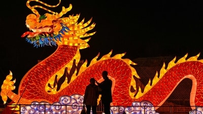 A giant dragon lantern installed at a park ahead of Lunar New Year celebrations in Wuhan, China on February 11. The Lunar New Year, most commonly associated with the Chinese New Year, kicked off on February 12. (Hector Retamal / AFP)