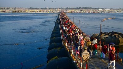 Despite the chilly weather, worshippers are propelled by unwavering faith as they take a dip, seeking virtue and salvation. (AFP) Despite the chilly weather, worshippers are propelled by unwavering faith as they take a dip, seeking virtue and salvation. (AFP)