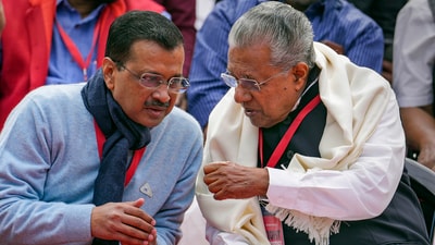 Delhi CM Arvind Kejriwal with his Kerala counterpart Pinarayi Vijayan during a protest in New Delhi against the Centre's alleged neglect and partiality in allocation of funds to their states. (PTI) Delhi CM Arvind Kejriwal with his Kerala counterpart Pinarayi Vijayan during a protest in New Delhi against the Centre's alleged neglect and partiality in allocation of funds to their states. (PTI)