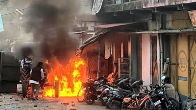 Haldwani: Vehicles set on fire by miscreants over the demolition of an "illegally built" madrasa at Banbhoolpura area, in Haldwani (PTI) Haldwani: Vehicles set on fire by miscreants over the demolition of an "illegally built" madrasa at Banbhoolpura area, in Haldwani (PTI)