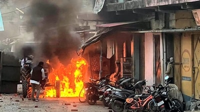 Haldwani: Vehicles set on fire by miscreants over the demolition of an "illegally built" madrasa at Banbhoolpura area, in Haldwani (PTI) Haldwani: Vehicles set on fire by miscreants over the demolition of an "illegally built" madrasa at Banbhoolpura area, in Haldwani (PTI)