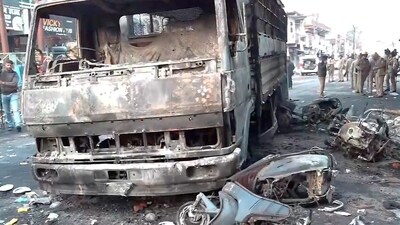 A day after the clashes, with curfew in force since 9 pm Thursday, Haldwani’s Banbhoolpura area looked deserted. Stones were strewn on the streets and there were charred remains of torched vehicles. (PTI) A day after the clashes, with curfew in force since 9 pm Thursday, Haldwani’s Banbhoolpura area looked deserted. Stones were strewn on the streets and there were charred remains of torched vehicles. (PTI)