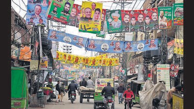 Party banners of election candidates from political parties are displayed on a street in Lahore. (AP) Party banners of election candidates from political parties are displayed on a street in Lahore. (AP)