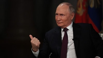 In this pool photograph distributed by Russian state agency Sputnik, Russia's President Vladimir Putin gives an interview to US talk show host Tucker Carlson at the Kremlin in Moscow on February 6, 2024. (Photo by Gavriil GRIGOROV / POOL / AFP) (AFP) In this pool photograph distributed by Russian state agency Sputnik, Russia's President Vladimir Putin gives an interview to US talk show host Tucker Carlson at the Kremlin in Moscow on February 6, 2024. (Photo by Gavriil GRIGOROV / POOL / AFP) (AFP)