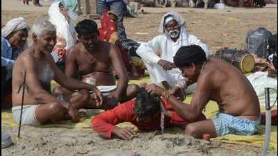 Sorcery being performed on banks of Sangam in February 2023 (HT File)