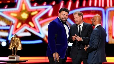Britain's Prince Harry, middle, presenter of the Walter Payton Man of the Year Award talks to winner Pittsburgh Steelers' Cameron Heyward, left, as Keegan-Michael Key looks on during the NFL Honors award show ahead of the Super Bowl 58 football game Thursday, Feb. 8, 2024, in Las Vegas. The San Francisco 49ers face the Kansas City Chiefs in Super Bowl 58 on Sunday. (AP Photo/David J. Phillip) (AP) Britain's Prince Harry, middle, presenter of the Walter Payton Man of the Year Award talks to winner Pittsburgh Steelers' Cameron Heyward, left, as Keegan-Michael Key looks on during the NFL Honors award show ahead of the Super Bowl 58 football game Thursday, Feb. 8, 2024, in Las Vegas. The San Francisco 49ers face the Kansas City Chiefs in Super Bowl 58 on Sunday. (AP Photo/David J. Phillip) (AP)