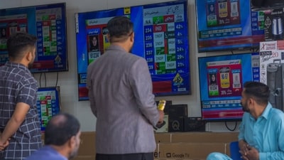 People monitor live election results on a screen in an electronic shop at a local market in Karachi, Pakistan, on Friday, Feb. 9, 2024. Vote-counting delays following Pakistan�s election on Thursday pointed to a disputed result as supporters of jailed former leader Imran Khan claimed a shock victory in a nation where the military retains a heavy influence on politics. Photographer: Asim Hafeez/Bloomberg (Bloomberg) People monitor live election results on a screen in an electronic shop at a local market in Karachi, Pakistan, on Friday, Feb. 9, 2024. Vote-counting delays following Pakistan�s election on Thursday pointed to a disputed result as supporters of jailed former leader Imran Khan claimed a shock victory in a nation where the military retains a heavy influence on politics. Photographer: Asim Hafeez/Bloomberg (Bloomberg)