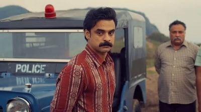 Tovino Thomas in a still from Anweshippin Kandethum. Tovino Thomas in a still from Anweshippin Kandethum.