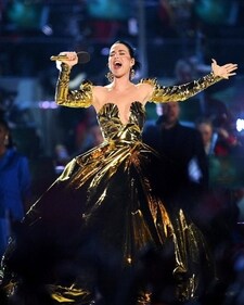 Singer Katy Perry wore a custom-gilded gold ballgown featuring a corseted bodice by Vivienne Westwood for King Charles III’s coronation concert earlier this year (Photo: Instagram)