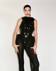 A model in a black sculpted chrome-leather corset from Mugler’s spring/summer 2024 collection (Photo: Instagram)