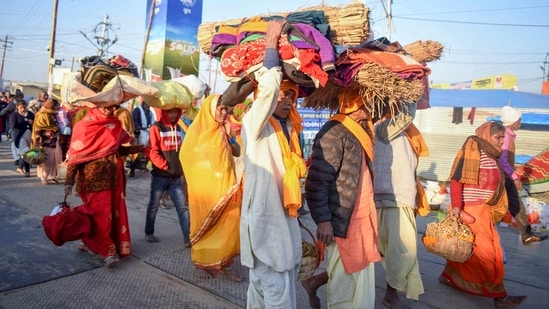 Hundreds of thousands of Hindu pilgrims take dips in the confluence, hoping to wash away sins during the month-long festival.&nbsp;(Anand Prashad)