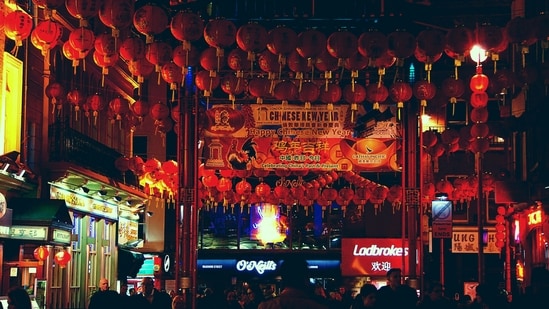 Red Decorations: Red is the dominant color during Chinese New Year, symbolizing good luck and prosperity. Homes and streets are adorned with red lanterns, couplets, and other decorations to ward off evil spirits and attract good fortune.&nbsp;(Unsplash)