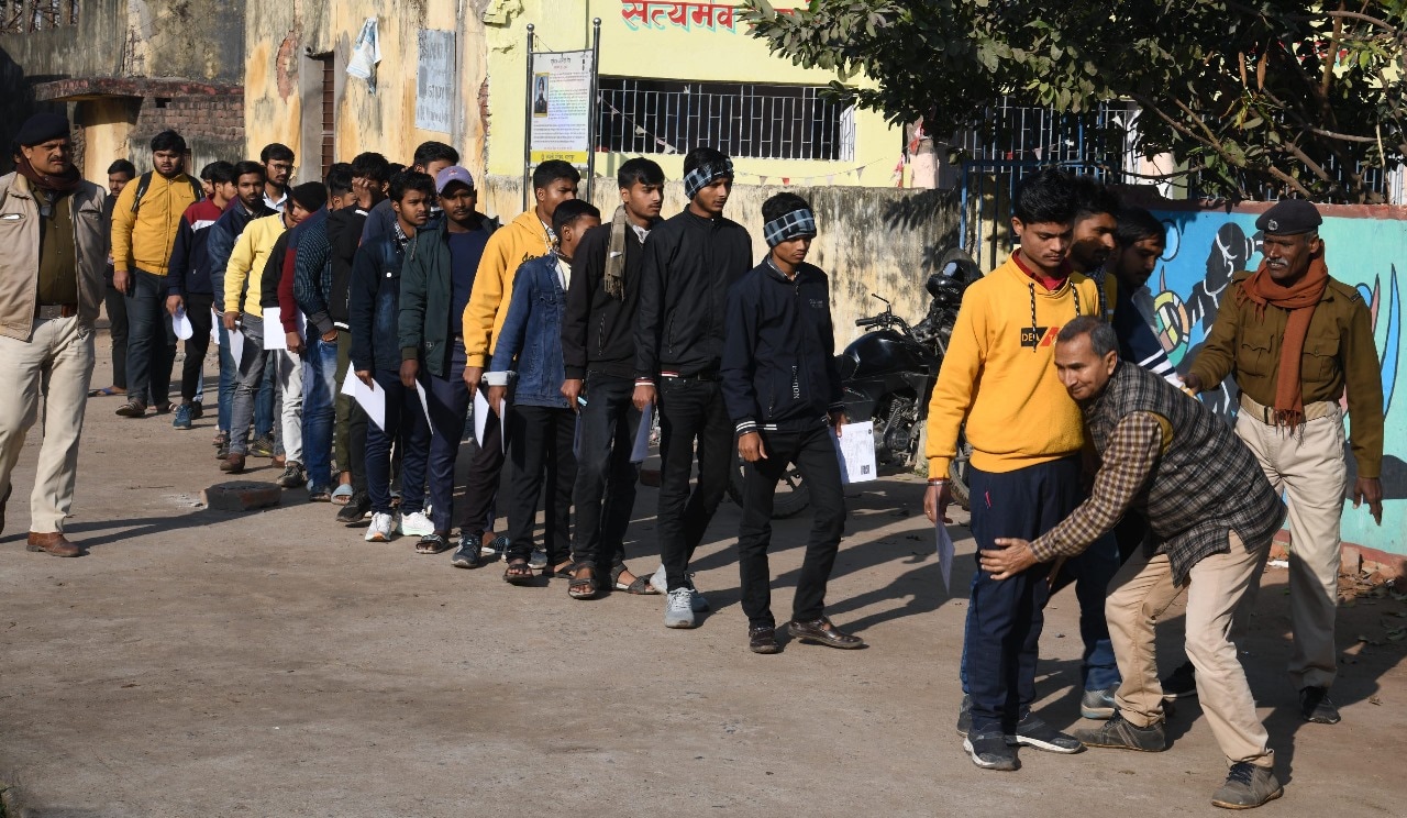 Students standing in queue to appear in the Bihar Board class 12th examination at Daldeo Inter School Danapur in Patna (Santosh Kumar )
