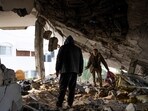 Israel-Hamas War: Palestinians check destruction after an Israeli strike in Rafah, Gaza Strip. Israel-Hamas War: Palestinians check destruction after an Israeli strike in Rafah, Gaza Strip.