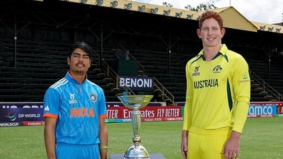 Skippers Uday Saharan and Hugh Weibgen pose for a photo with the trophy on the eve of the final between India U19 and Australia U19 (ICC - X ) Skippers Uday Saharan and Hugh Weibgen pose for a photo with the trophy on the eve of the final between India U19 and Australia U19 (ICC - X )