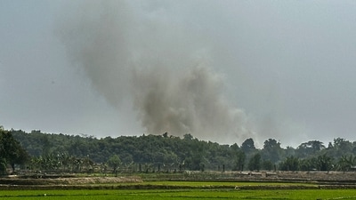 Smoke is seen bellowing from a Myanmar Border Police post following fighting between Myanmar security forces and Arakan Army, an ethnic minority army, in Ghumdhum, Bandarban, Bangladesh, on Monday, Feb. 5, 2024. Nearly a hundred members of Myanmar's Border Guard Police have fled their posts and taken shelter in Bangladesh during fighting between Myanmar security forces and an ethnic minority army, an official of Bangladesh's border agency said Monday. (AP Photo/Shafiqur Rahman) (AP) Smoke is seen bellowing from a Myanmar Border Police post following fighting between Myanmar security forces and Arakan Army, an ethnic minority army, in Ghumdhum, Bandarban, Bangladesh, on Monday, Feb. 5, 2024. Nearly a hundred members of Myanmar's Border Guard Police have fled their posts and taken shelter in Bangladesh during fighting between Myanmar security forces and an ethnic minority army, an official of Bangladesh's border agency said Monday. (AP Photo/Shafiqur Rahman) (AP)