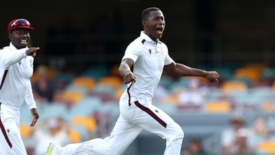 Shamar Joseph of the West Indies (R) dismisses Josh Hazlewood of Australia, sealing a win for the West Indies (AFP)