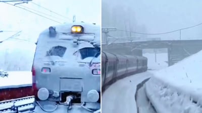 The image shows an Indian Railways train covered in snow while passing through Jammu and Kashmir. (X/@RailMinIndia) The image shows an Indian Railways train covered in snow while passing through Jammu and Kashmir. (X/@RailMinIndia)