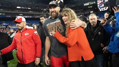 FILE - Kansas City Chiefs tight end Travis Kelce and Taylor Swift walk together after an AFC Championship NFL football game between the Chiefs and the Baltimore Ravens, Jan. 28, 2024, in Baltimore.. Taylor Swift, who is holding concerts in Japan, will make it in time for the Super Bowl to see her partner and football superstar Travis Kelce play. (AP Photo/Julio Cortez, File) (AP) FILE - Kansas City Chiefs tight end Travis Kelce and Taylor Swift walk together after an AFC Championship NFL football game between the Chiefs and the Baltimore Ravens, Jan. 28, 2024, in Baltimore.. Taylor Swift, who is holding concerts in Japan, will make it in time for the Super Bowl to see her partner and football superstar Travis Kelce play. (AP Photo/Julio Cortez, File) (AP)