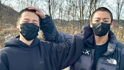 BTS members Jimin and Jungkook pose with each other. BTS members Jimin and Jungkook pose with each other.
