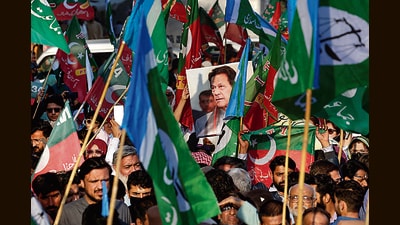 Supporters of Imran Khan’s PTI in Karachi on Saturday. (REUTERS) Supporters of Imran Khan’s PTI in Karachi on Saturday. (REUTERS)