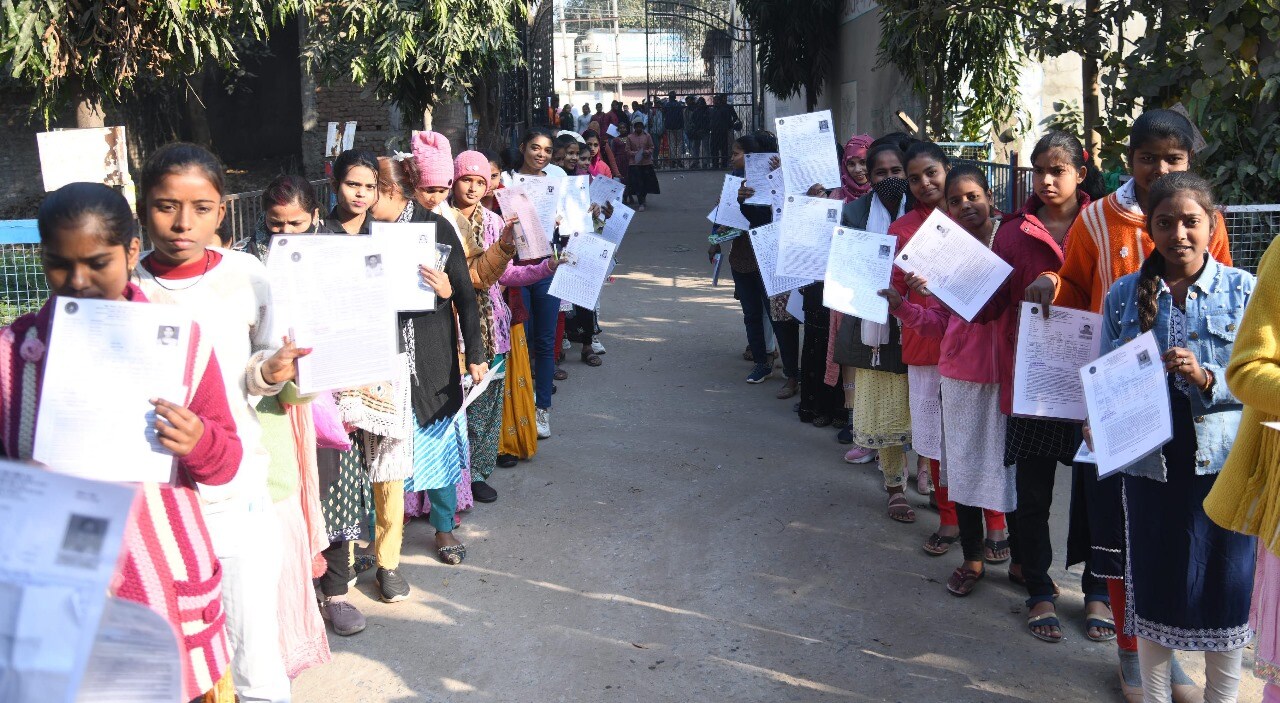 Students standing in queue to appear in the Bihar Board class 12th examination at D.D. Nandan Kanya High School Danapur in Patna  (Santosh Kumar )