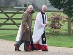 King Charles III and Queen Camilla walk with Canon Paul Williams as they arrive to attend a Sunday church service at St Mary Magdalene Church, in Sandringham. King Charles III and Queen Camilla walk with Canon Paul Williams as they arrive to attend a Sunday church service at St Mary Magdalene Church, in Sandringham.